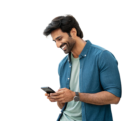 Man smiling while using his phone